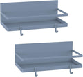 Gray magnetic spice shelf with removable hooks mounted on the side of a metal appliance.