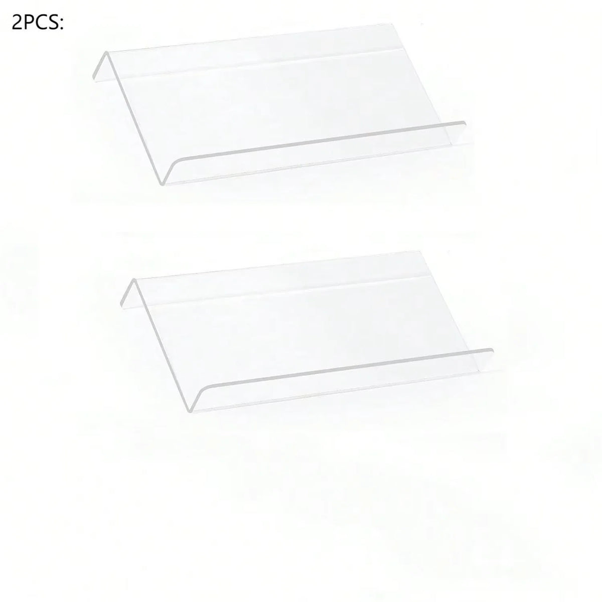 Adjustable acrylic spice organizer tray inside an open kitchen drawer holding spice jars at an angle.