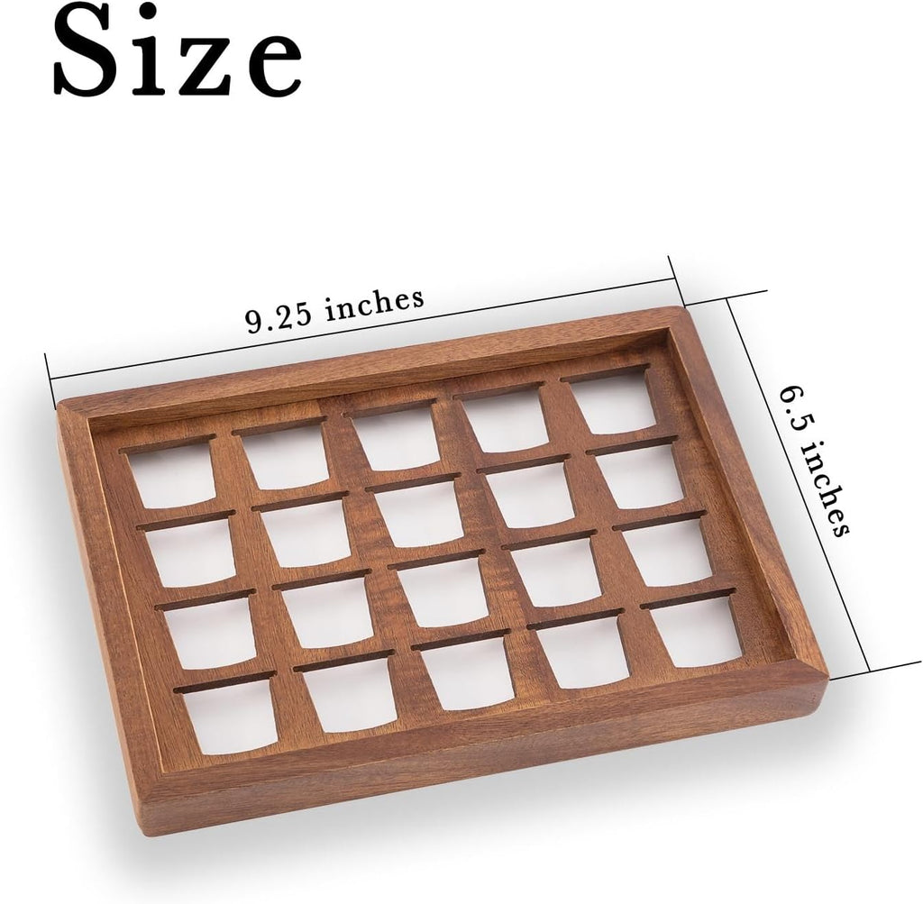 Two acacia wood coffee pod holder trays displayed on a kitchen countertop coffee bar.