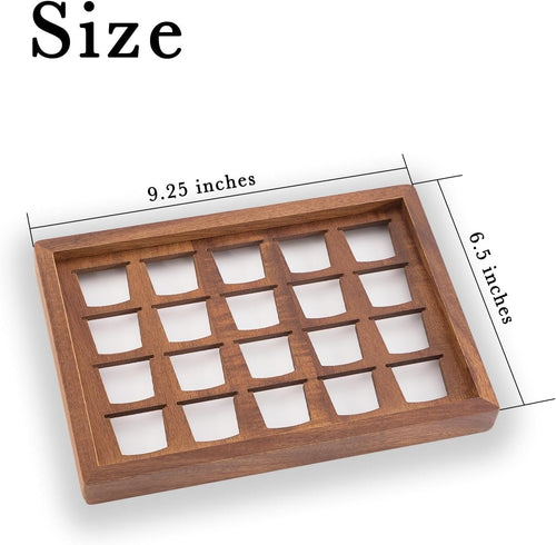 Two acacia wood coffee pod holder trays displayed on a kitchen countertop coffee bar.