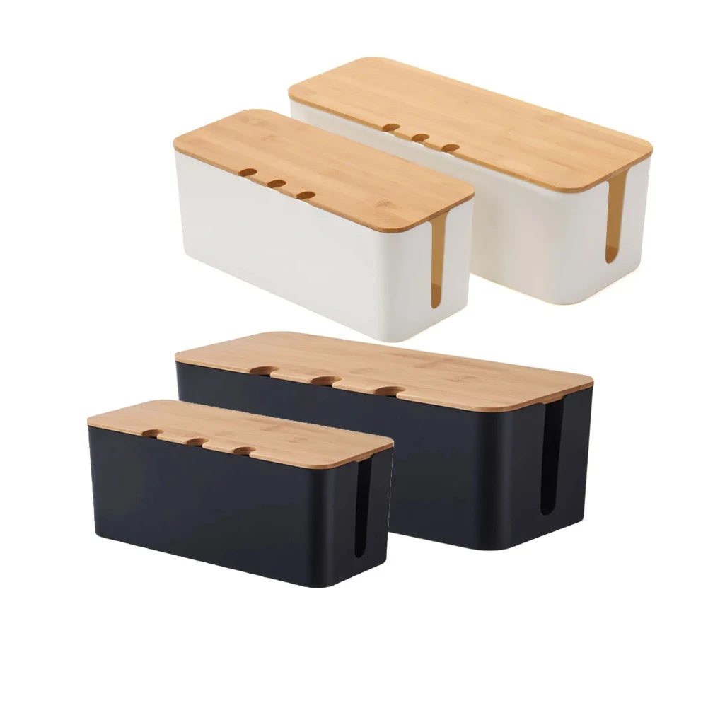 Wooden-style cable management box concealing cords and a power strip under a desk.