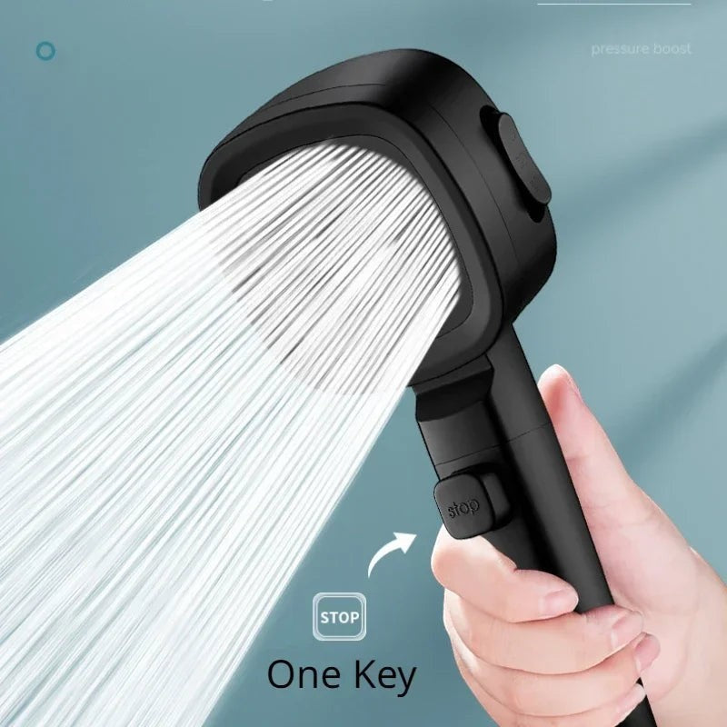 High-pressure water-saving shower head mounted in a modern bathroom.