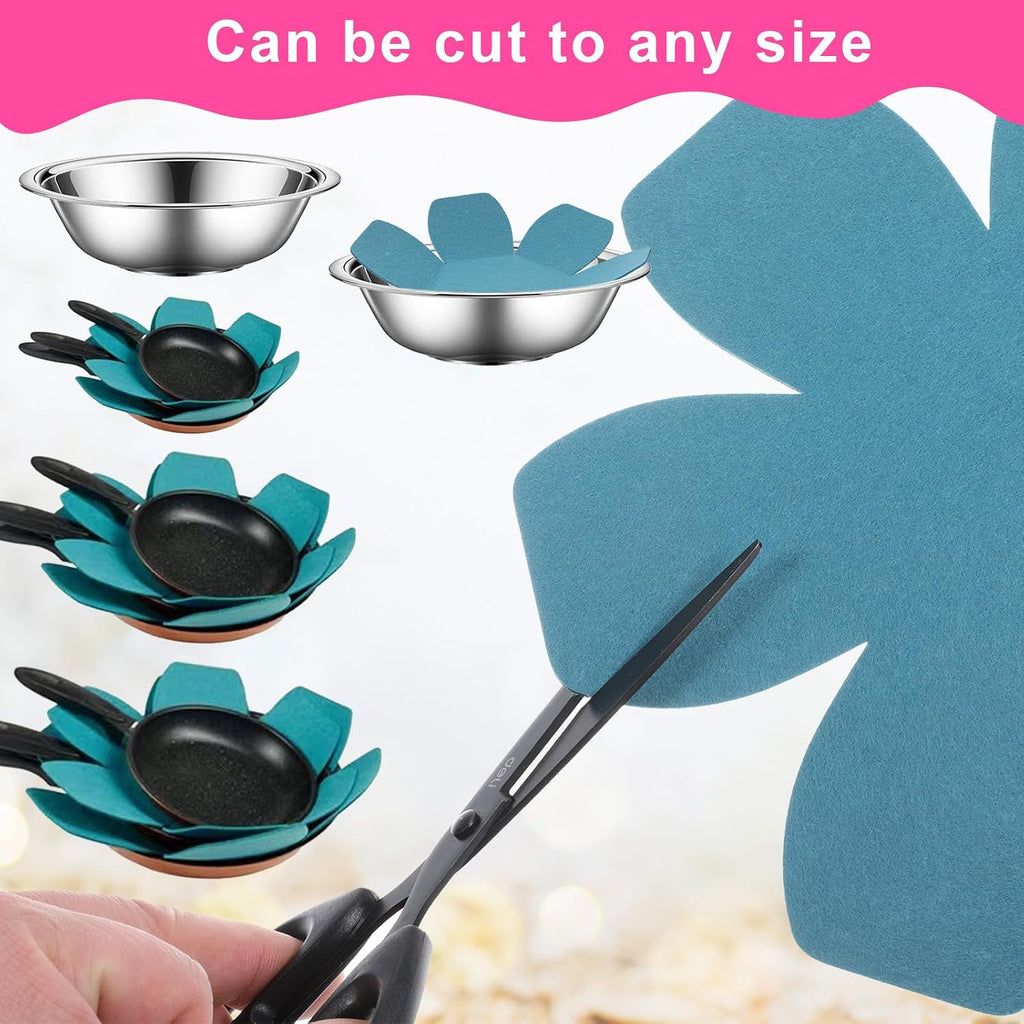 Blue pan protectors separating stacked pots and pans in a kitchen cabinet.