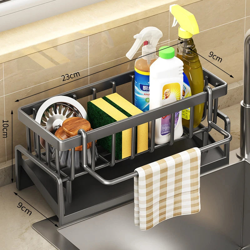 Tap-mounted sink shelf with drainage holes holding a sponge and dish soap.