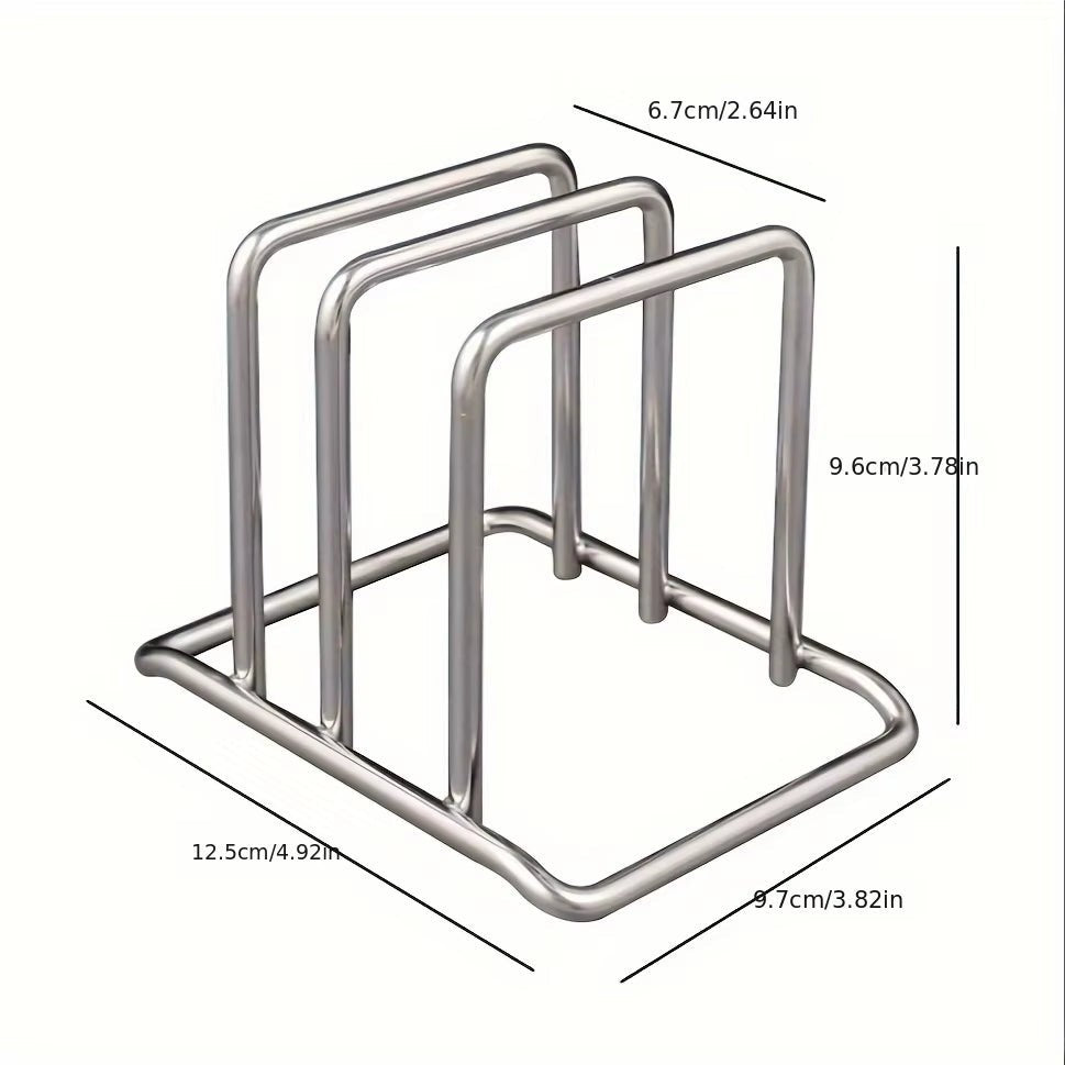 Stainless steel countertop rack organizing pot lids and cutting boards side by side.
