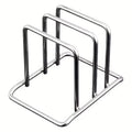 Stainless steel countertop rack organizing pot lids and cutting boards side by side.