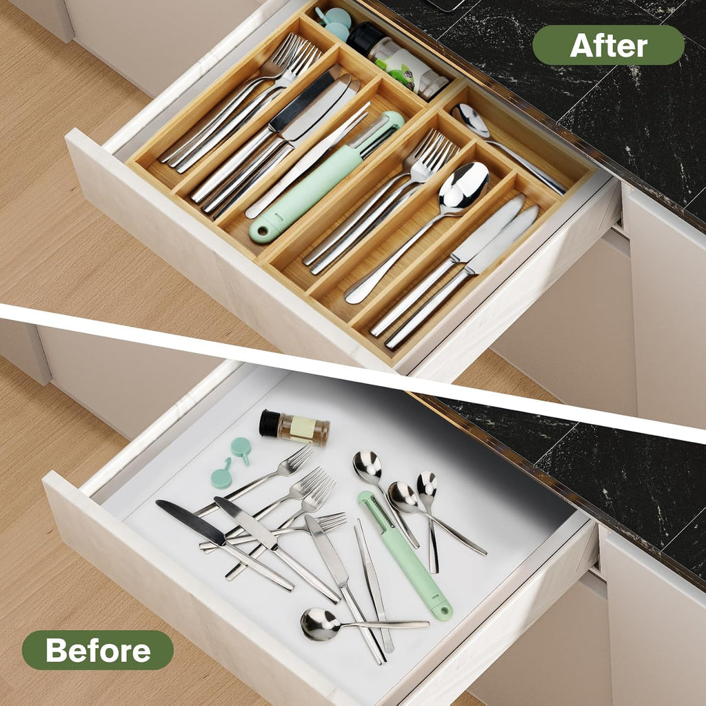 Bamboo silverware drawer organizer holding neatly divided spoons, forks, and knives.