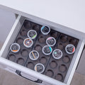 Coffee pod drawer organizer tray holding K-Cup pods with non-slip pads underneath.
