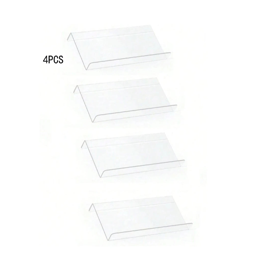 Adjustable acrylic spice organizer tray inside an open kitchen drawer holding spice jars at an angle.