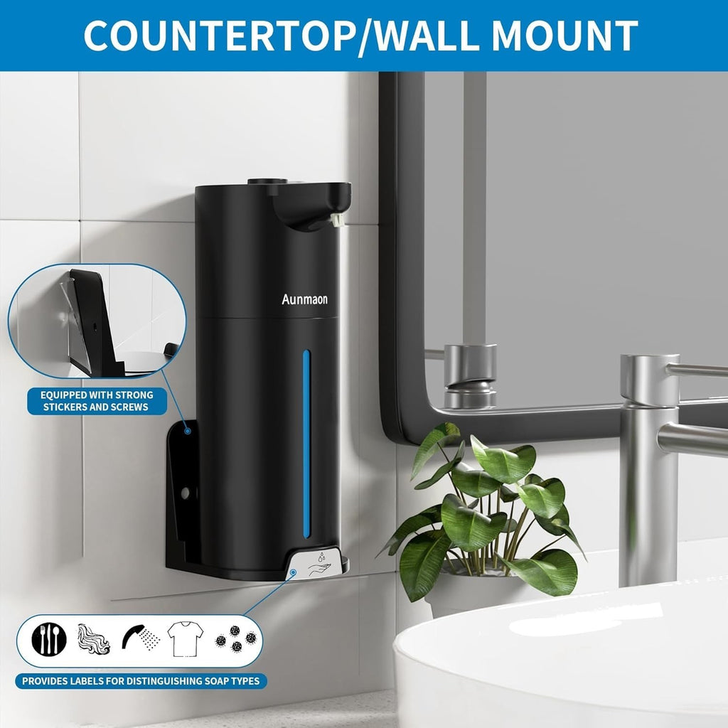 Touchless automatic soap dispenser mounted near a kitchen sink dispensing liquid soap.