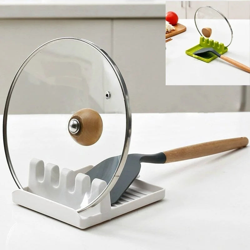 Non-slip kitchen utensil holder resting a spoon and spatula on a countertop.