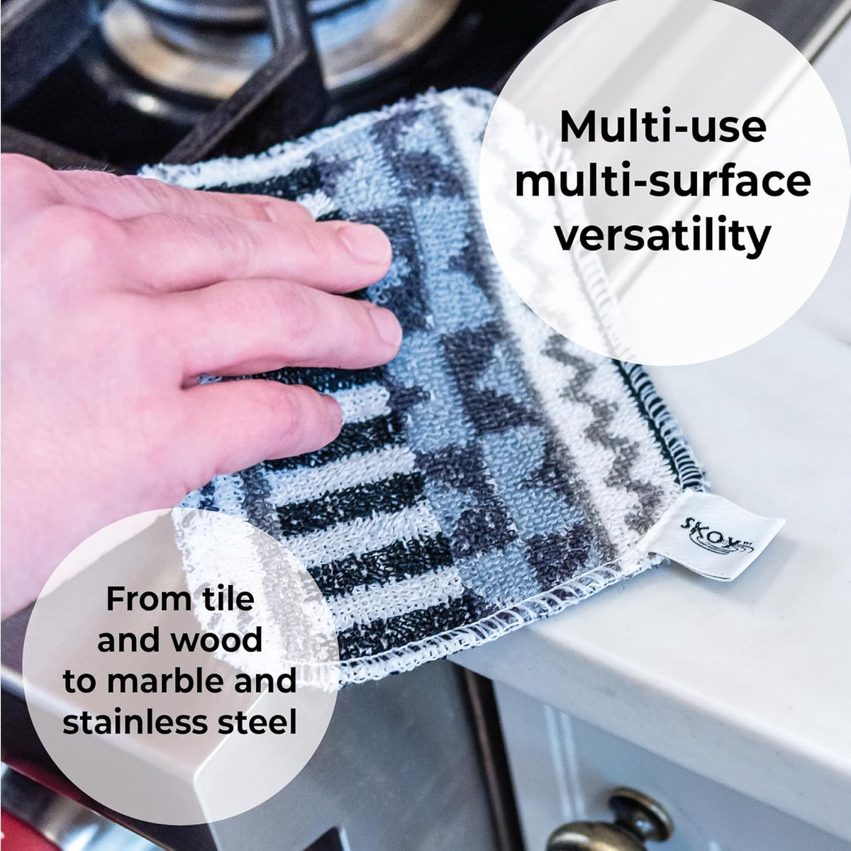 Set of four reusable non-scratch dish scrubbers in assorted colors on a kitchen counter.