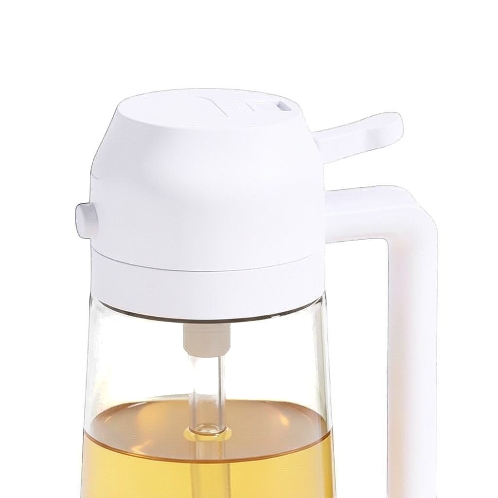 Simpson 500ml 2-in-1 oil bottle with white handle and nozzle, featuring a clear glass base for pouring or spraying oil.