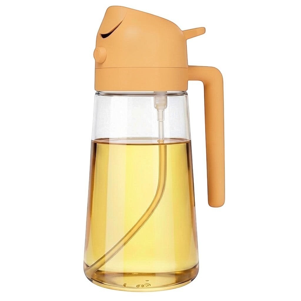 Simpson 500ml 2-in-1 olive oil spray and pour bottle with a clear glass body and peach-colored handle and nozzle.
